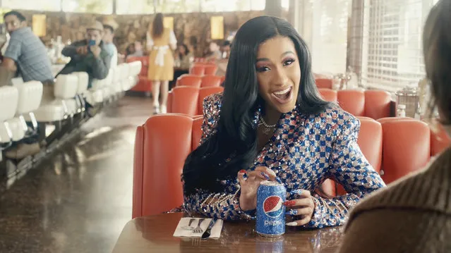 This screen grab from video provided by PepsiCo shows an image from the company's 2019 Super Bowl NFL football spot featuring Cardi B. Star power abounds in this year’s Super Bowl ads. (Photo by PepsiCo via AP Photo)