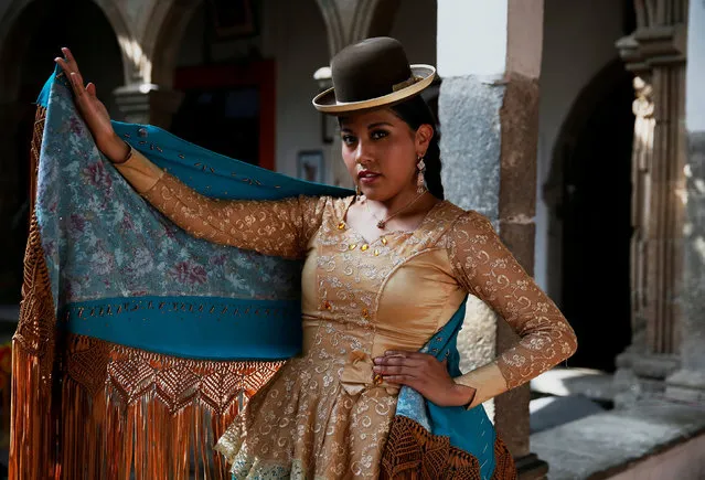 A Cholita (Andean woman) model poses during a practice session of Rosario Aguilar fashion model school in La Paz, Bolivia, February 23, 2019. (Photo by David Mercado/Reuters)