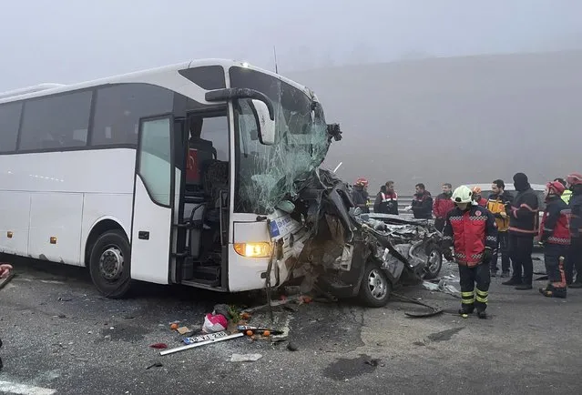 Officials investigate at the site of seven vehicles crash, in Sakarya Turkey, Thursday, December 28, 2023. Turkish officials say a chain-reaction crash Thursday involving seven vehicles on a motorway in northwest Turkey has killed at least 10 people and injured 57 others. The pileup occurred Thursday in dense fog and low visibility some 93 miles from Istanbul. (Photo by IHA via AP Photo)
