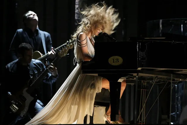 Taylor Swift performs “All Too Well” at the 56th annual Grammy Awards in Los Angeles, California January 26, 2014. (Photo by Mario Anzuoni/Reuters)