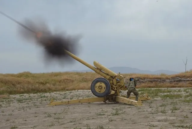 Afghan National Army soldiers fire artillery during a battle with Taliban insurgents in Kunduz, Afghanistan, April 29, 2015. The U.S. military has sent fighter jets to Afghanistan's northern province of Kunduz, where Taliban insurgents have launched a major offensive and overrun government checkpoints close to the main city, U.S. and Afghan sources said. (Photo by Reuters/Stringer)