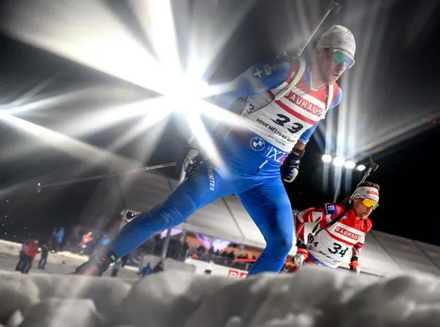 Greece's Apostolos Angelis (L) and Austria's Felix Leitner compete during the men's 20 km individual event of the IBU Biathlon World Championships in Nove Mesto, Czech Republic on February 14, 2024. (Photo by Joe Klamar/AFP Photo)