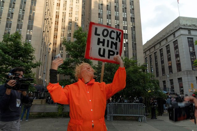 A person impersonates Republican presidential candidate and former U.S. President Donald Trump outside the Manhattan criminal court following the announcement of the verdict in Trump's criminal trial over charges that he falsified business records to conceal money paid to silence p*rn star Stormy Daniels in 2016, in New York City, U.S. May 30, 2024. (Photo by Cheney Orr/Reuters)