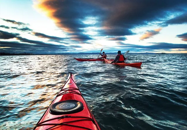 Kayakers at sunset on the Firth of Forth in Edinburgh, Scotland on April 7, 2017. (Photo by Murdo Macleod/The Guardian)