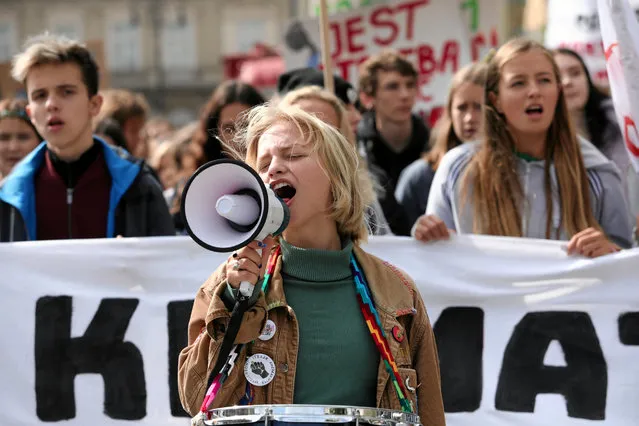 Young activists take part in an environmental demonstration, part of the Global Climate Strike, in Krakow, Poland on September 20, 2019. (Photo by Jakub Wlodek/Agencja Gazeta via Reuters)