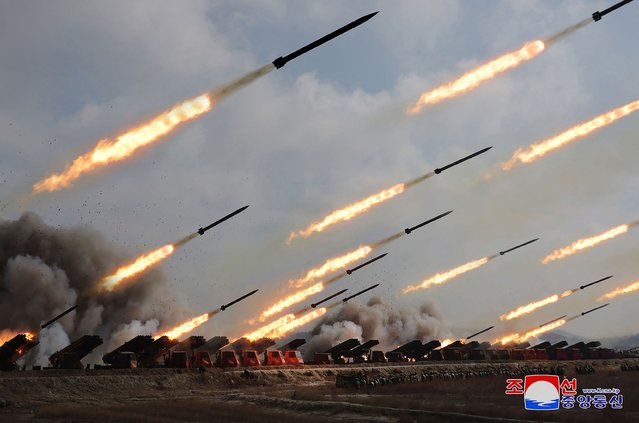 This picture taken on March 7, 2024 and released from North Korea's official Korean Central News Agency (KCNA) via KNS on March 8, 2024 shows a joint forces artillery training exercise at an undisclosed location in North Korea. (Photo by KCNA via KNS/AFP Photo)