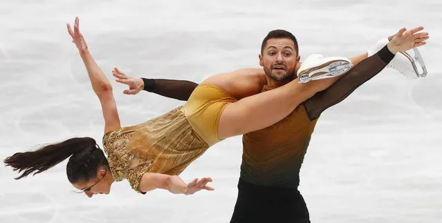 Lilah Fear and Lewis Gibson of Britian perform in the Ice Dance Free Dance Program at the ISU 2022 Figure Skating World Championships in Montpellier, France, 26 March 2022. (Photo by Guillaume Horcajuelo/EPA/EFE)