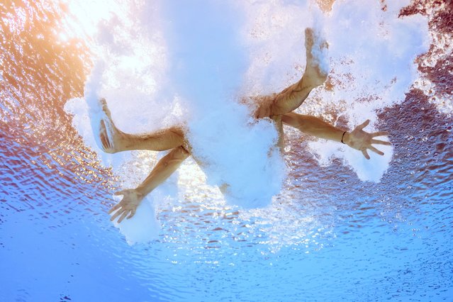 An underwater view shows France's Jules Bouyer competing in the men's 3m springboard diving final during the Paris 2024 Olympic Games at the Aquatics Centre in Saint-Denis, north of Paris, on August 8, 2024. (Photo by Oli Scarff/AFP Photo)