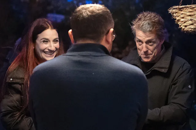 Actor Hugh Grant and Liberal Democrat Luciana Berger (L) speak to a local resident during a campaign event in Finchley on December 1, 2019 in London, England. UK voters are set to go to the polls on December 12 in the country's third general election in less than five years. (Photo by Leon Neal/Getty Images)