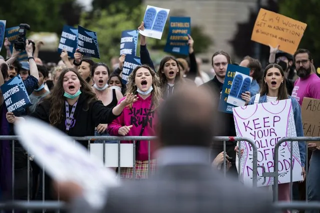 Abortion rights advocates and antiabortion advocates demonstrate outside the Supreme Court after a leak of a draft majority opinion overturning abortion rights, on Capitol Hill on Tuesday, May 03, 2022 in Washington, DC. (Photo by Jabin Botsford/The Washington Post)