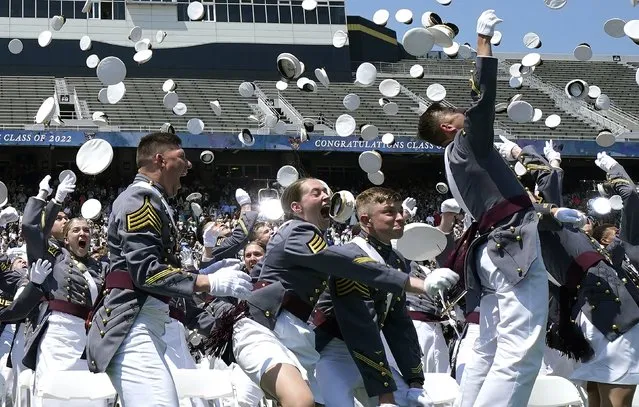 Class of 2022 cadets celebrate their graduation during commencement ceremonies at the US Military Academy West Point, on May 21, 2022, in New York. Graduating cadets will be commissioned as second lieutenants in the US Army. (Photo by Timothy A. Clary/AFP Photo)