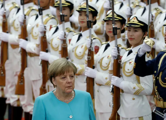 German Chancellor Angela Merkel attends a welcoming ceremony at the Great Hall of the People in Beijing, China, June 13, 2016. (Photo by Kim Kyung-Hoon/Reuters)