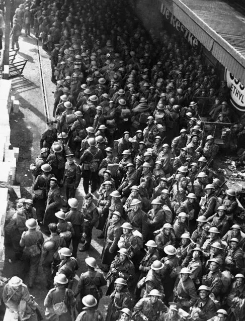 A seething, but surprisingly orderly mass of steel hats, as more and still more thousands more of the B.E.F. return to England, June 1, 1940. (Photo by AP Photo)