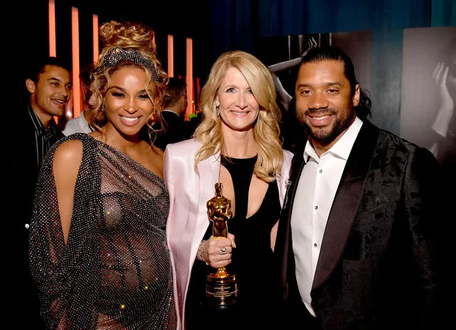 (L-R) Ciara, Laura Dern, and Russell Wilson attend the 2020 Vanity Fair Oscar Party hosted by Radhika Jones at Wallis Annenberg Center for the Performing Arts on February 09, 2020 in Beverly Hills, California. (Photo by Matt Winkelmeyer/VF20/WireImage)