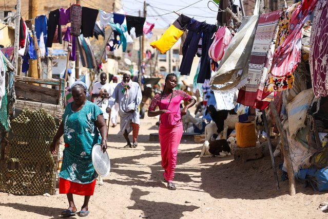 A general view of the Guet Ndar, the most populous neighborhood in Senegal as daily life continues on November 03, 2024 in Saint-Louis, Senegal. The crowded and narrow streets of Guet Ndar, where almost all of the residents earn their living from fishing, lead to a long beach lined with hundreds of colorful fishing boats. Guet Ndar neighborhood, between the Atlantic ocean and the Senegal River, is one of the most populous regions of the country. (Photo by Cem Ozdel/Anadolu via Getty Images)