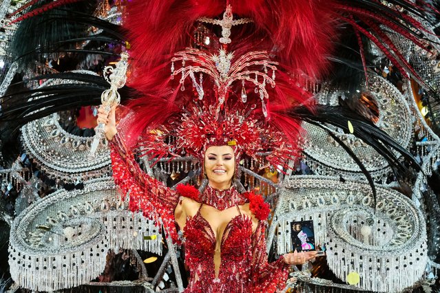 Candidate Lola Ortiz wears the creation “Perfidia de amor” (Perfidy of love), for which she won the title Carival Queen, during the Las Palmas de Gran Canaria Carnival Queen election gala, in Las Palmas, Canary Islands, Spain, 24 February 2023. (Phoot by Angel Medina G./EPA)