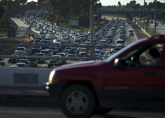 Traffic backs-up going south into Mexico in the border town of San Ysidro, California. September 3, 2015. (Photo by Mike Blake/Reuters)