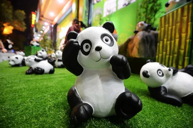 Pandas made up of moso bamboo scraps are exhibited at Yang City, October 15, 2014, in Yangzhou, China. About 100 pandas are exhibited to draw people's attention to forest protection. (Photo by ChinaFotoPress/Getty Images)