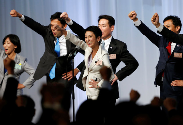 Japan's main opposition Democratic Party's new leader Renho (C) raises her fists with her party lawmakers after she was elected party leader at the party plenary meeting in Tokyo, Japan September 15, 2016. (Photo by Toru Hanai/Reuters)