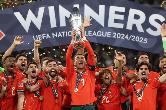 Cristiano Ronaldo of Portugal lifts the UEFA Nations League trophy after his team's victory in the UEFA Nations League 2025 final match between Portugal and Spain at Munich Football Arena on June 08, 2025 in Munich, Germany. (Photo by Lars Baron/Getty Images)