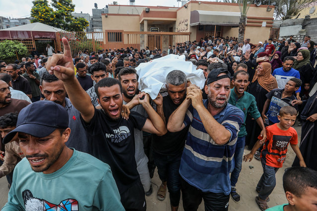 Relatives mourn their loss as a funeral ceremony is held at Nasser Hospital following Israeli strikes on various areas of Khan Yunis, Gaza, on June 22, 2025. (Photo by Abed Rahim Khatib/Anadolu via Getty Images)