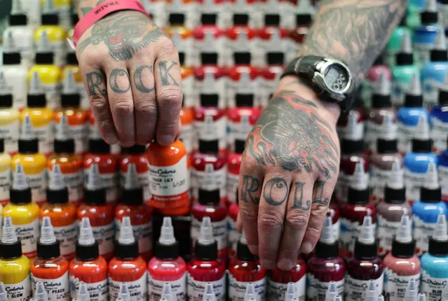 Bottles of ink at a tattoo artist’s booth  at the International London Tattoo Convention in London, Britain September 23, 2016. (Photo by Yui Mok/PA Wire)