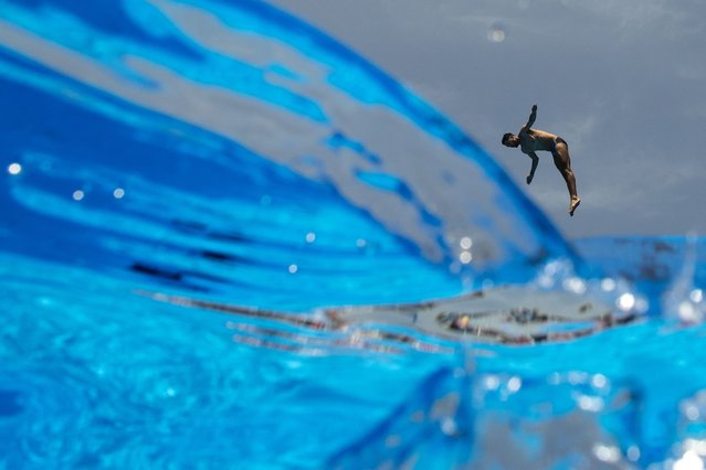 Colombia’s Juan Manuel Gil competes in the men’s 27 metres high-diving contest at the World Aquatics Championships in Singapore on July 24, 2025. (Photo by Marko Djurica/Reuters)