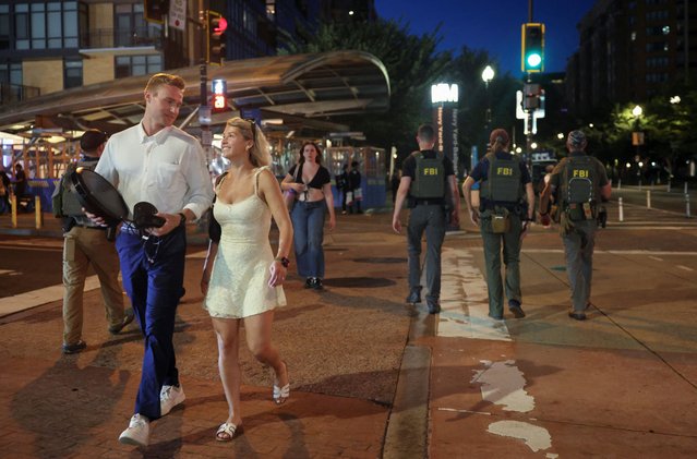 FBI agents patrol the Navy Yard neighborhood, after U.S. President Donald Trump's announcement to deploy the National Guard and federalize the Metropolitan Police Department in Washington, D.C., U.S., August 12, 2025. (Photo by Evelyn Hockstein/Reuters)