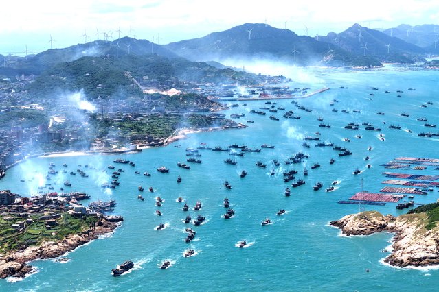 An aerial view of fishing boats departing for fishing from the fishing ports on August 16, 2025 in Fuzhou, Fujian Province of China. Fishing boats set sail on August 16 after the summer fishing ban lifted in South China Sea. (Photo by Wang Wangwang/VCG via Getty Images)