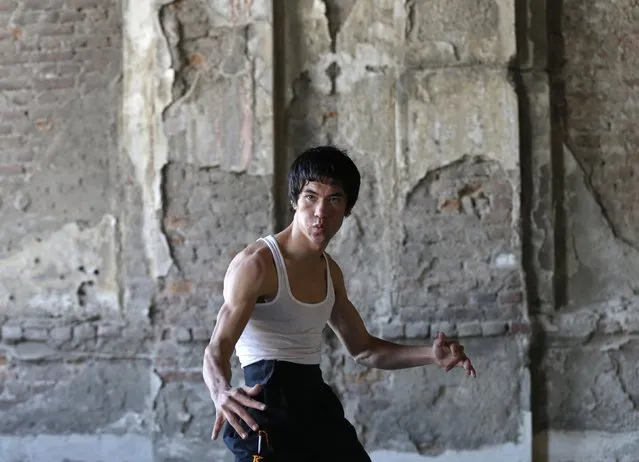 Abbas Alizada, who calls himself the Afghan Bruce Lee, poses for the media in Kabul December 9, 2014. (Photo by Mohammad Ismail/Reuters)