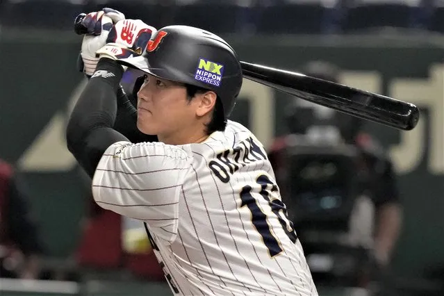 Shohei Ohtani of Japan hits a double in the fourth inning of the Pool B game against China, at the World Baseball Classic (WBC) in Tokyo, Japan, Thursday, March 9, 2023. (Photo by Eugene Hoshiko/AP Photo)