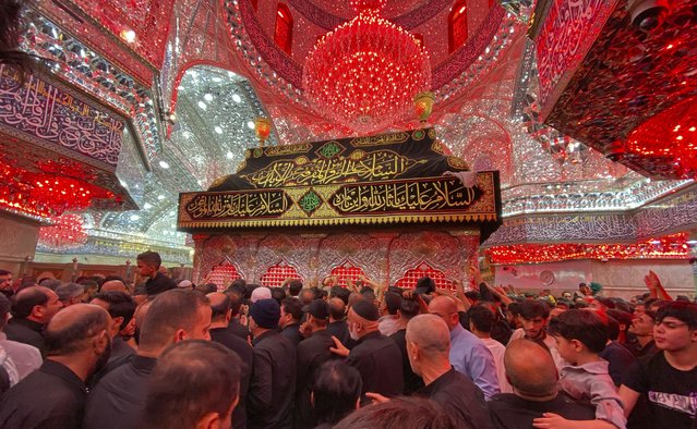 Shiite worshippers visit the holy shrine of Imam Husseinon, during “Muharram”, a period of mourning for Shiites in Karbala, Iraq, Friday, July 25, 2025. (Phoot by Hadi Mizban/AP Photo)