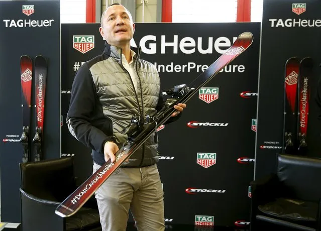 Marc Glaeser, CEO of Swiss manufacturer Stoeckli displays a ski of the new TAG Heuer Stoeckli special ski edition during a news conference in Malters, Switzerland November 25, 2015. Stoeckli plans to produce some 1,000 pair of skis per year of a special edition for Swiss watch manufacturer TAG Heuer, a brand of LVMH Group. (Photo by Arnd Wiegmann/Reuters)