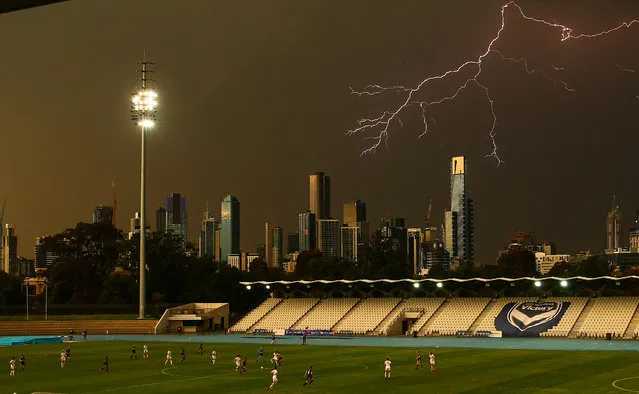 A general view as lightning strikes near buildings in the city of Melbourne during the round eight W-League match between the Melbourne Victory and Western Sydney Wanderers at Lakeside Stadium on November 24, 2017 in Melbourne, Australia. (Photo by Scott Barbour/Getty Images)
