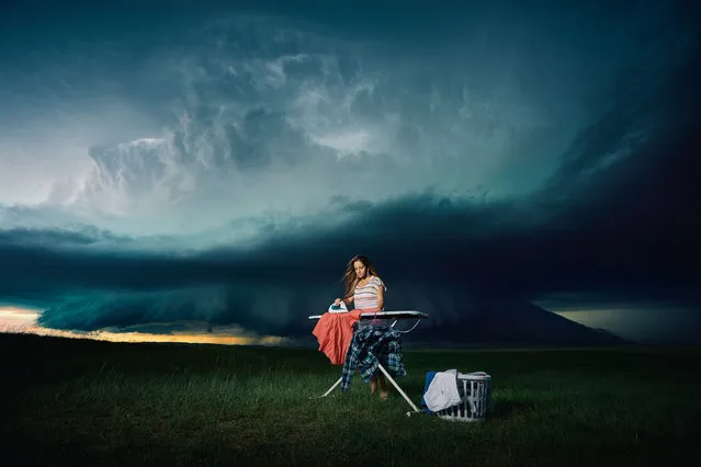 Models pose in front of a storm in Boyes, Montana. (Photo by Benjamin Von Wongs/Caters News)