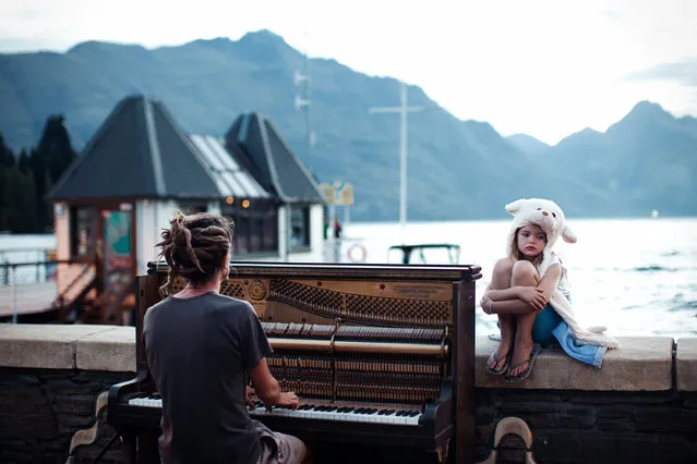 Merit Winner: “Piano play at sunset”. Streets of Queenstown, New Zealand at the end of one more day filled with adrenaline. Calming and doleful scene with piano sound in the background. (Photo and caption by Nikola Smernic/National Geographic Traveler Photo Contest)