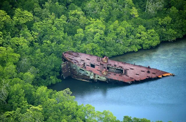 Debris of the United States Naval transport vessel remains abondoned after stranded on August 31, 2016 in Nggela Islands, Solomon Islands. (Photo by The Asahi Shimbun via Getty Images)