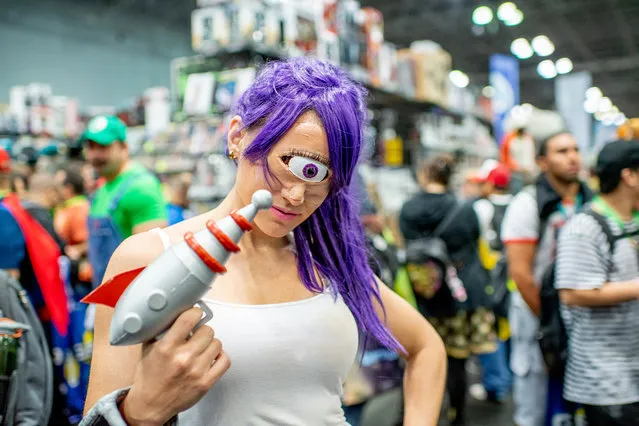 A fan cosplays as Leela from the TV show Futurama during the 2018 New York Comic Con at Javits Center on October 4, 2018 in New York City. (Photo by Roy Rochlin/Getty Images)