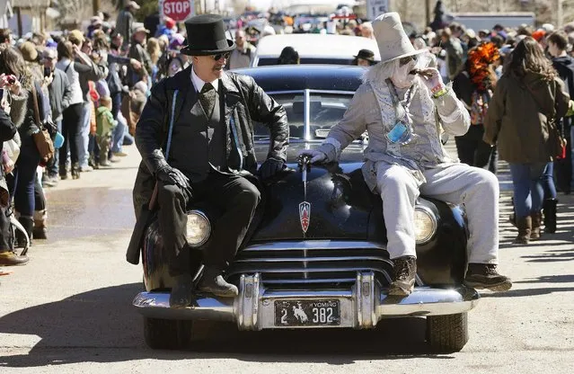 The Parade of Hearses moves down First Street at Frozen Dead Guy Days in Nederland, Colorado March 14, 2015. (Photo by Rick Wilking/Reuters)