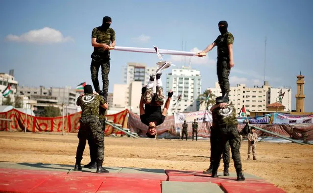 Members of Palestinian National Security Forces loyal to Hamas performs impressive martial arts skills during a military graduation ceremony, in Gaza City January 22, 2017. (Photo by Suhaib Salem/Reuters)
