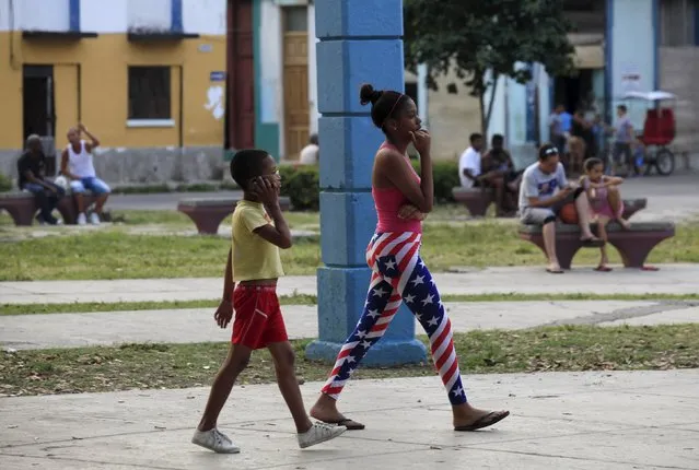 A girl wears pants with the colours of the U.S. flag in Havana March 15, 2016. (Photo by Enrique de la Osa/Reuters)