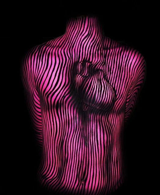 Optical illusion bodypaint. (Photo by Natalie Fletcher/Cater News)