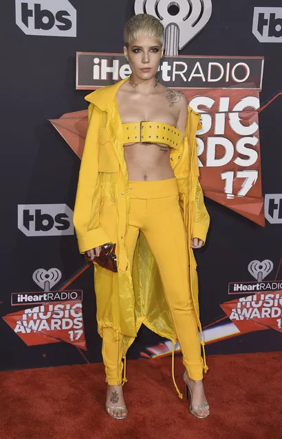 Halsey arrives at the iHeartRadio Music Awards at the Forum on Sunday, March 5, 2017, in Inglewood, Calif. (Photo by Jordan Strauss/Invision/AP Photo)