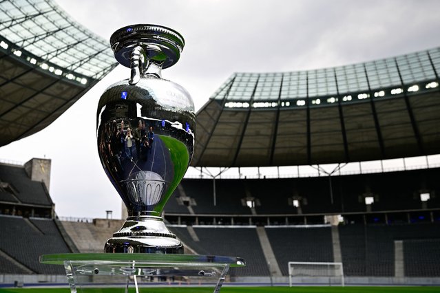 The trophy for the UEFA Euro 2024 European Football Championship is displayed at the Olympic Stadium in Berlin, Germany on April 24, 2024. The UEFA EURO 2024 European Football Championship will take place from June 14 to July 14 in ten stadiums around Germany including Berlin's Olympic Stadium. (Photo by Tobias Schwarz/AFP Photo)