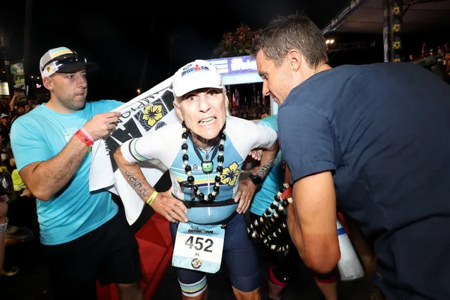 Al Tarkington, 80-years-old, of the United States is the final finisher at the Ironman World Championships on October 12, 2019 in Kailua Kona, Hawaii. (Photo by Sean M. Haffey/Getty Images for IRONMAN)