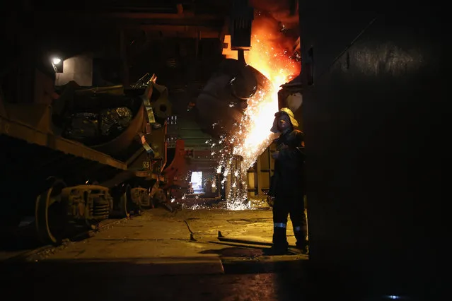 Molten steel is poared in the Metinvest Ilyich Iron and Steel Works on May 22, 2014 in Mariupol, Ukraine. Rinal Akhmetov, the owner of the factory and richest man in Ukraine has come out against pro-Russian separatists in eastern Ukraine ahead of Sunday's presidential election. (Photo by John Moore/Getty Images)