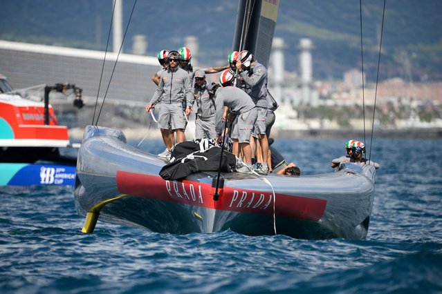 Italy's Luna Rossa Prada Pirelli team members prepare to compete on the fifth day of the 37th America's Cup-Luis Vuitton semi-finals race, off the coast of Barcelona on September 19, 2024. (Photo by Josep Lago/AFP Photo)