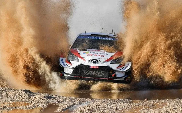 Finnish driver Juho Hanninen and co-driver Tomi Tuominen steer their Toyota Yaris WRC during the SS1 Super Special Shakedown stage of the Rally of Sardegna at the Ittiri arena on June 13, 2019. (Photo by Andreas Solaro/AFP Photo)