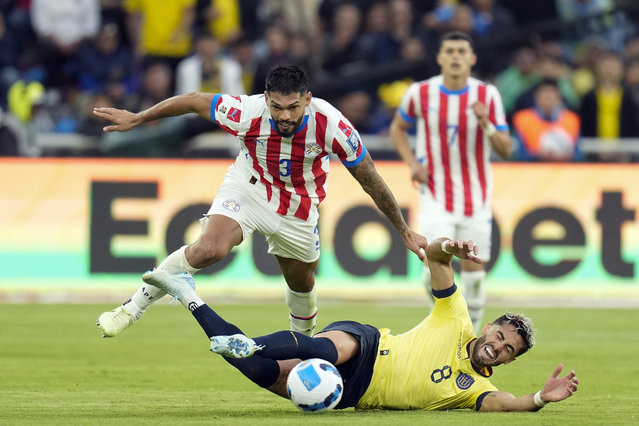 Ecuador's Leonardo Campana fights for the ball with Paraguay's Omar Alderete during a qualifying soccer match for the FIFA World Cup 2026 at Rodrigo Paz Delgado stadium in Quito, Ecuador, Thursday, October 10, 2024. (Photo by Dolores Ochoa/AP Photo)