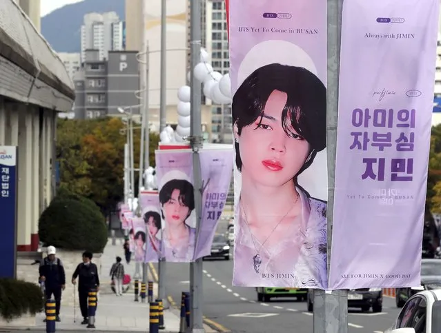 Banners featuring Jimin, a member of South Korean K-pop band BTS, are displayed along a road near Busan Asiad Main Stadium in Busan, South Korea Wednesday, October 12, 2022, three days before the boy band stages a massive live concert. (Photo by Sang Duck-chul/Yonhap via AP Photo)